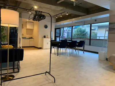 a kitchen and dining room with a table and chairs at Spacious studio(62m2) in western Shinjuku in Tokyo