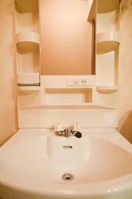 a bathroom with a sink and a mirror at North Shinjuku house 5\u99c5\u5f92\u6b69\u570f\u5185\u306e\u5317\u65b0\u5bbf\u306e\u5bb6 in Tokyo