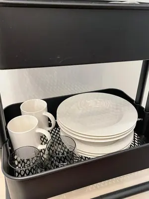 a tray with dishes and cups and plates in a drawer at BEST LOCATED SHINJUKU CENTRAL Full-Furnished APARTMENT 3minWalk to Station1 in Tokyo