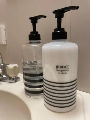 two soap bottles sitting on top of a sink at Best Shinjuku Modern Full-furnished Apartment1 ONLY 2min to Shinjuku by Train in Tokyo