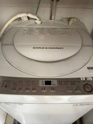 a close up of a washing machine in a room at Best Shinjuku Modern Full-furnished Apartment2 ONLY 2min to Shinjuku by Train in Tokyo