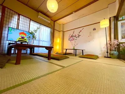 a living room with a television on a table at Shinjuku Shin-Okubo Station Nippon no Yado in Tokyo