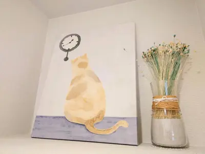 a painting of a cat sitting on a shelf next to a vase at Ueno Colon Hotel in Tokyo