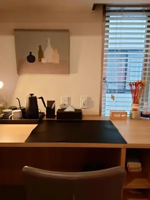 a kitchen with a counter top with a sink at Ueno Colon Hotel in Tokyo
