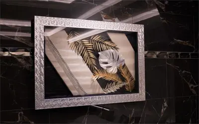 a picture of a dress with feathers on a wall at HOTEL KABUKI in Tokyo