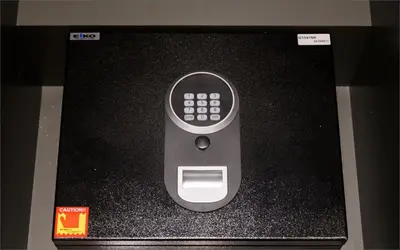 a remote control sitting on top of a table at HOTEL KABUKI in Tokyo