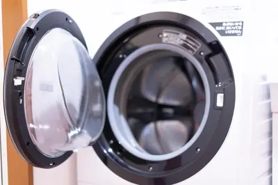 a washer and a dryer sitting next to each other at SATELLITE HOTEL Roppongi \u30b5\u30c6\u30e9\u30a4\u30c8\u30db\u30c6\u30eb\u516d\u672c\u6728 in Tokyo