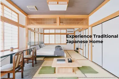 an apartment traditional japanese home with a bed and a table at Japanese Tradition Hotel Evergreen in Tokyo