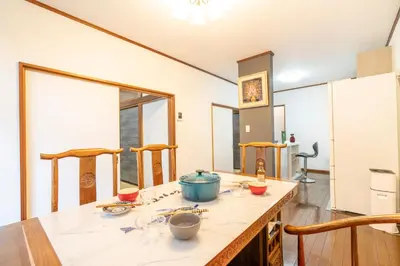 a kitchen with a table with some bowls on it at JR 66sqm 1F Family Suite 2LDK JR Koiwa-Keisei Koiwa-Asakusa-Oshiage-Shinjuku-Ueno in Tokyo