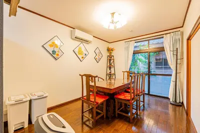 a dining room with a table and a toilet at JR 66sqm 1F Family Suite 2LDK JR Koiwa-Keisei Koiwa-Asakusa-Oshiage-Shinjuku-Ueno in Tokyo