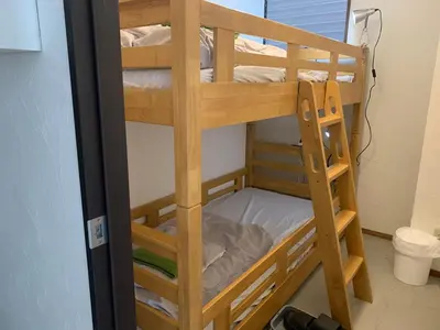 a couple of bunk beds in a room at Hostel Lodging Tokyo Ueno in Tokyo