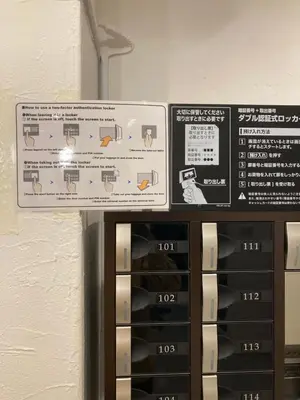 a sign that is above two microwaves at Hostel Lodging Tokyo Ueno in Tokyo
