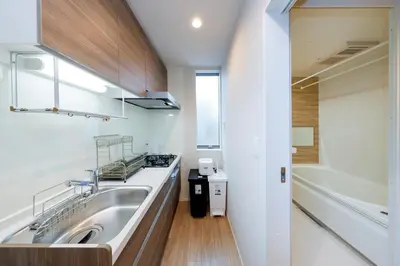 a bathroom with a sink and a bath tub at Higashi Komagata House by Tranova in Tokyo