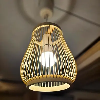 a light fixture hanging from a ceiling at ueno minowa401 in Tokyo