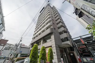 a building under construction with a crane at Square Shibuya in Tokyo
