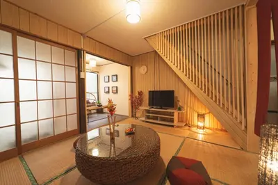 a living room with a couch and a television at Sumida-ku - House - Vacation STAY 14512 in Tokyo