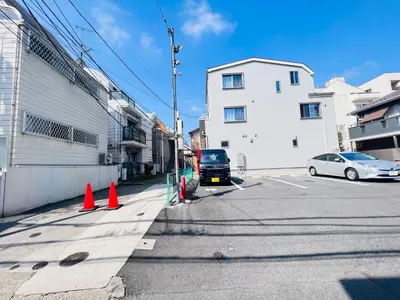 a street with orange cones and a truck on the street at OkuboZYZ SJ0244 in Tokyo