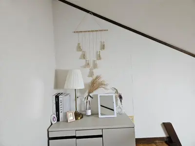 a room with a table with a lamp and a mirror at Shibuya SG House Free Wifi in Tokyo