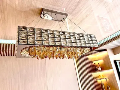 a chandelier hanging from the ceiling in a room at Reimi Mondo9 in Tokyo
