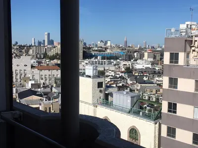 a view of a city from a window at 10 minutes direct to Shibuya Crossing! Heart of Tokyo! Mishuku in Tokyo